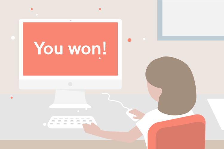 Woman in front of laptop screen that states "You won!"